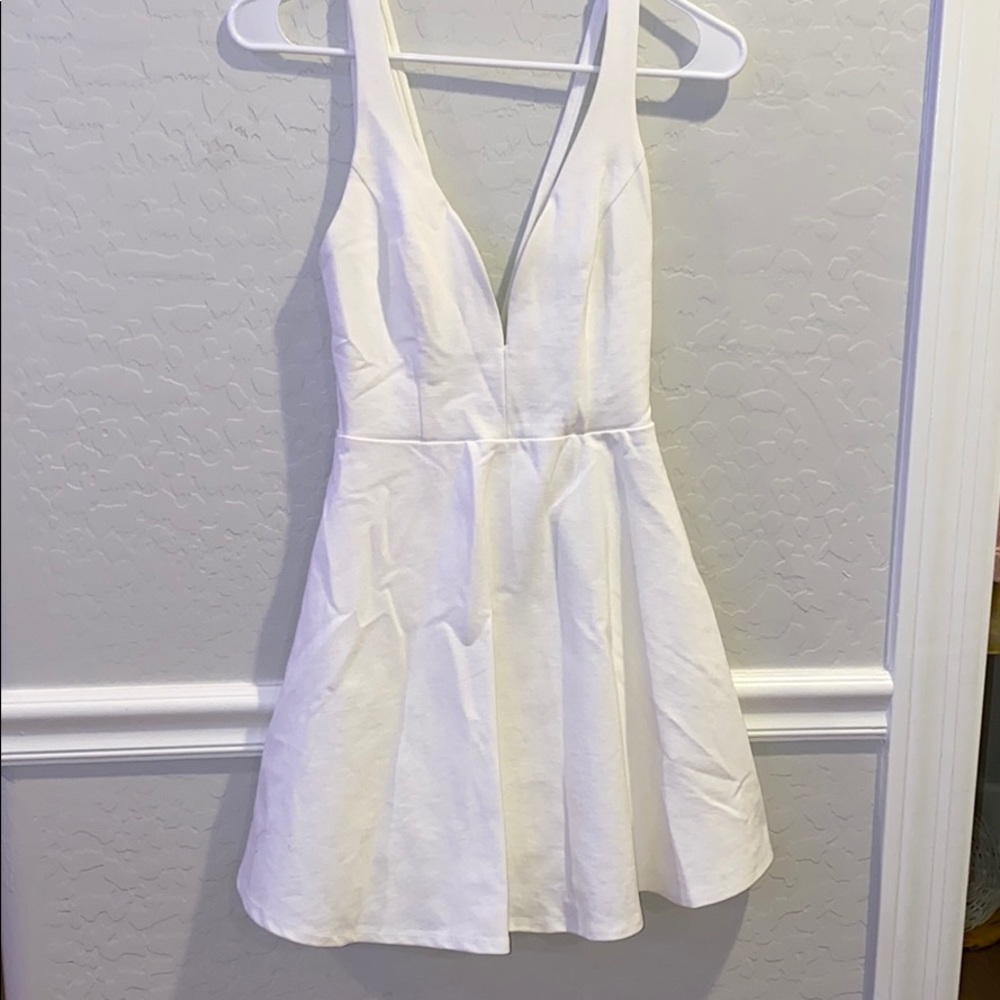 Super cute white lulus dress.